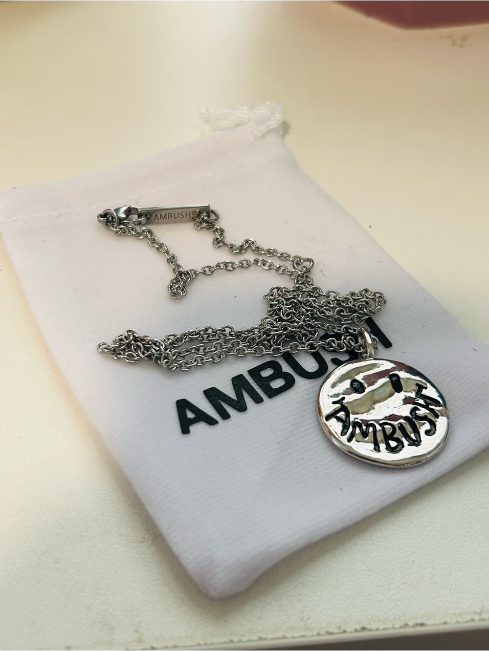 AMBUSH Silver Smiley Pendant Necklace